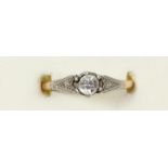 A 9ct gold and platinum single stone paste ring, O 1/2, 2.2gm
