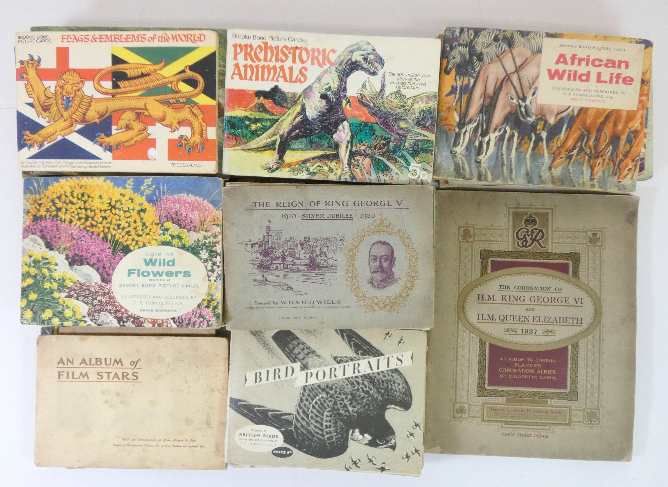 A collection of sixty card companion albums, including albums from Players, Brooke Bond and W.D. &