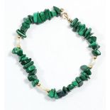 A 14k gold mounted malachite and pearl bracelet, 18cm
