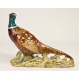 A Beswick model of a pheasant, number 1225.