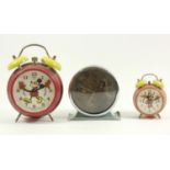 Two Bradley alarm clocks, depicting Mikey and Minnie Mouse, made in Germany with license from Walt