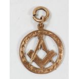 A 9ct gold Masonic pendant, Birmingham 1919, 22mm, 3.8gm