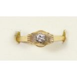 An 18ct gold and single brilliant cut diamond ring, N, 2.8gm