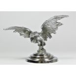 A chrome car mascot in the form of an eagle mounted on a stepped base (one wing repaired) 14cm.