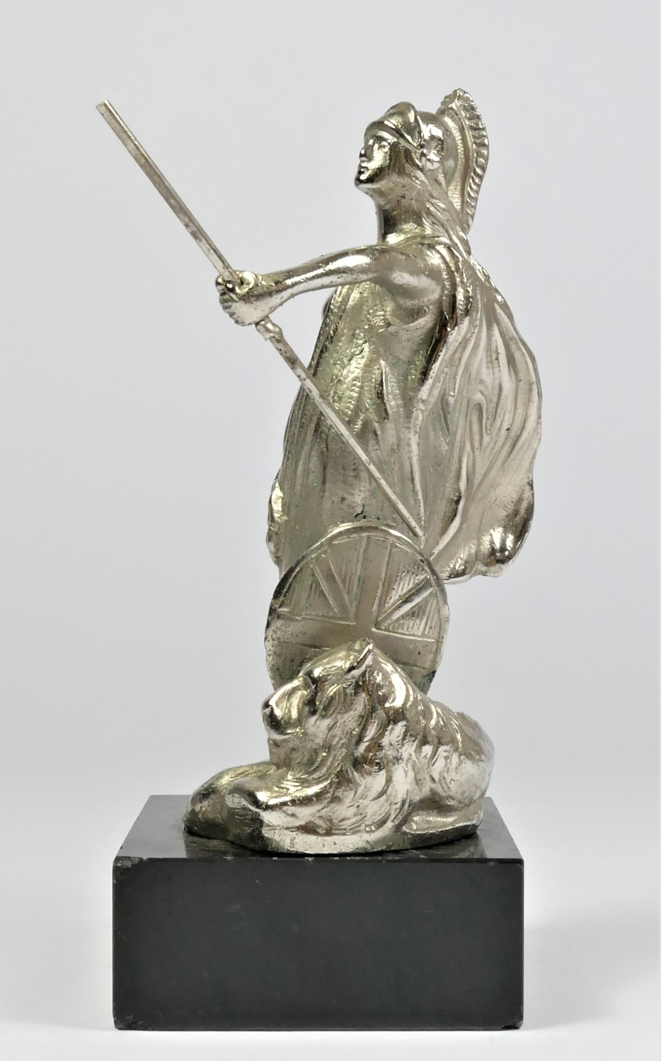 A chrome car mascot in the form of Britannia raised on a black marble base, 17cm. - Image 2 of 2