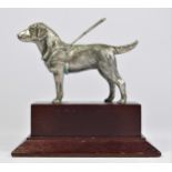 A chrome car mascot in the form of a Guide Dog, mounted on a wooden base, 15cm.