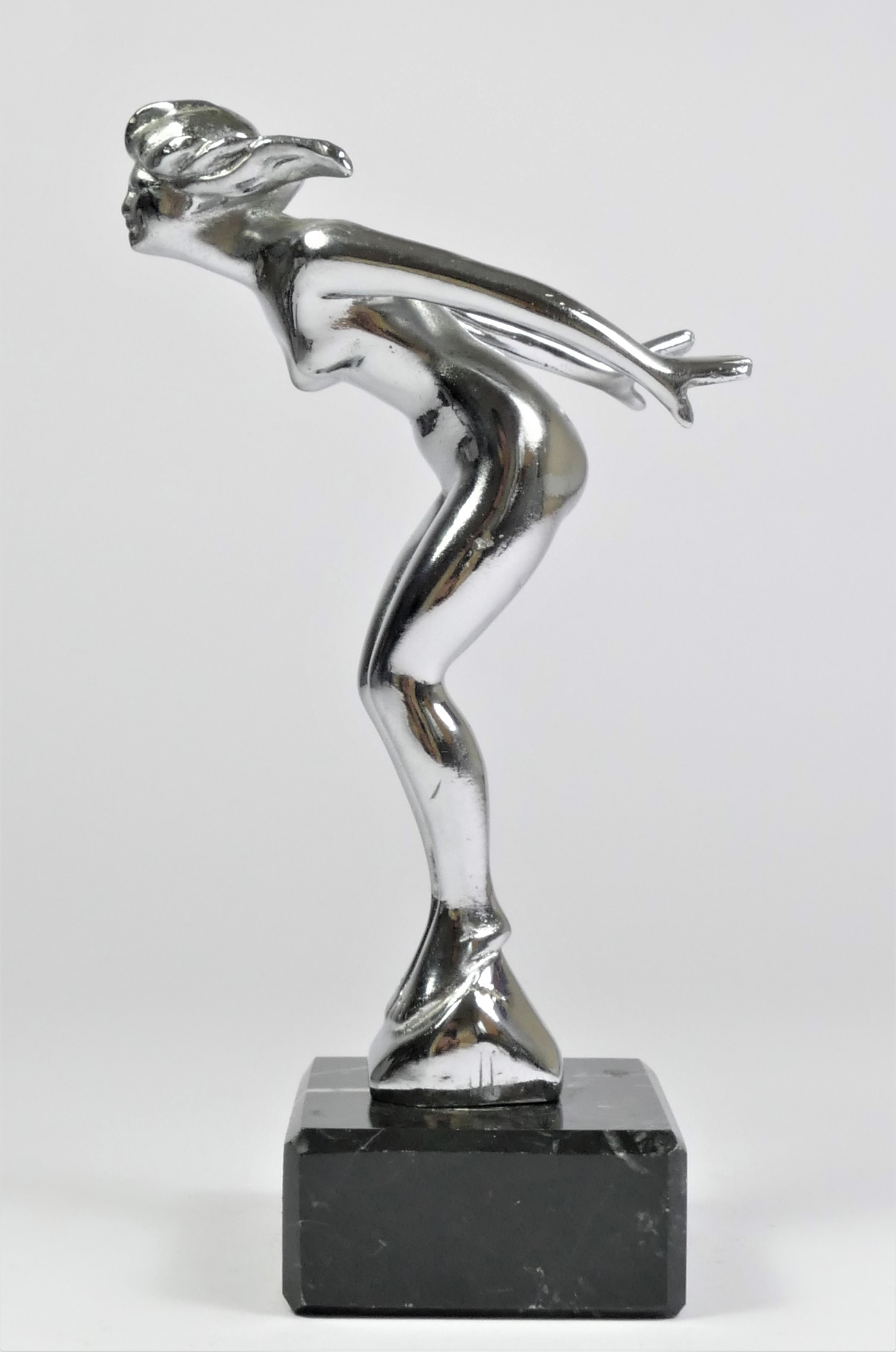 A chrome plated car mascot, Speed Nymph' after A. E. Lejeune Ltd , modelled as a nude female with