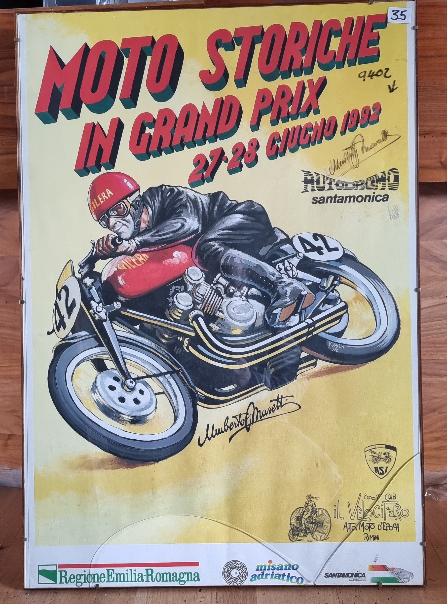 Moto Storiche 1992 Motorcycle Poster, framed, signed by Umberto Massetti to the glass (AF) 70 x