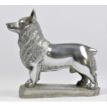 A chrome car mascot in the form of a Corgi, not mounted, 10cm.