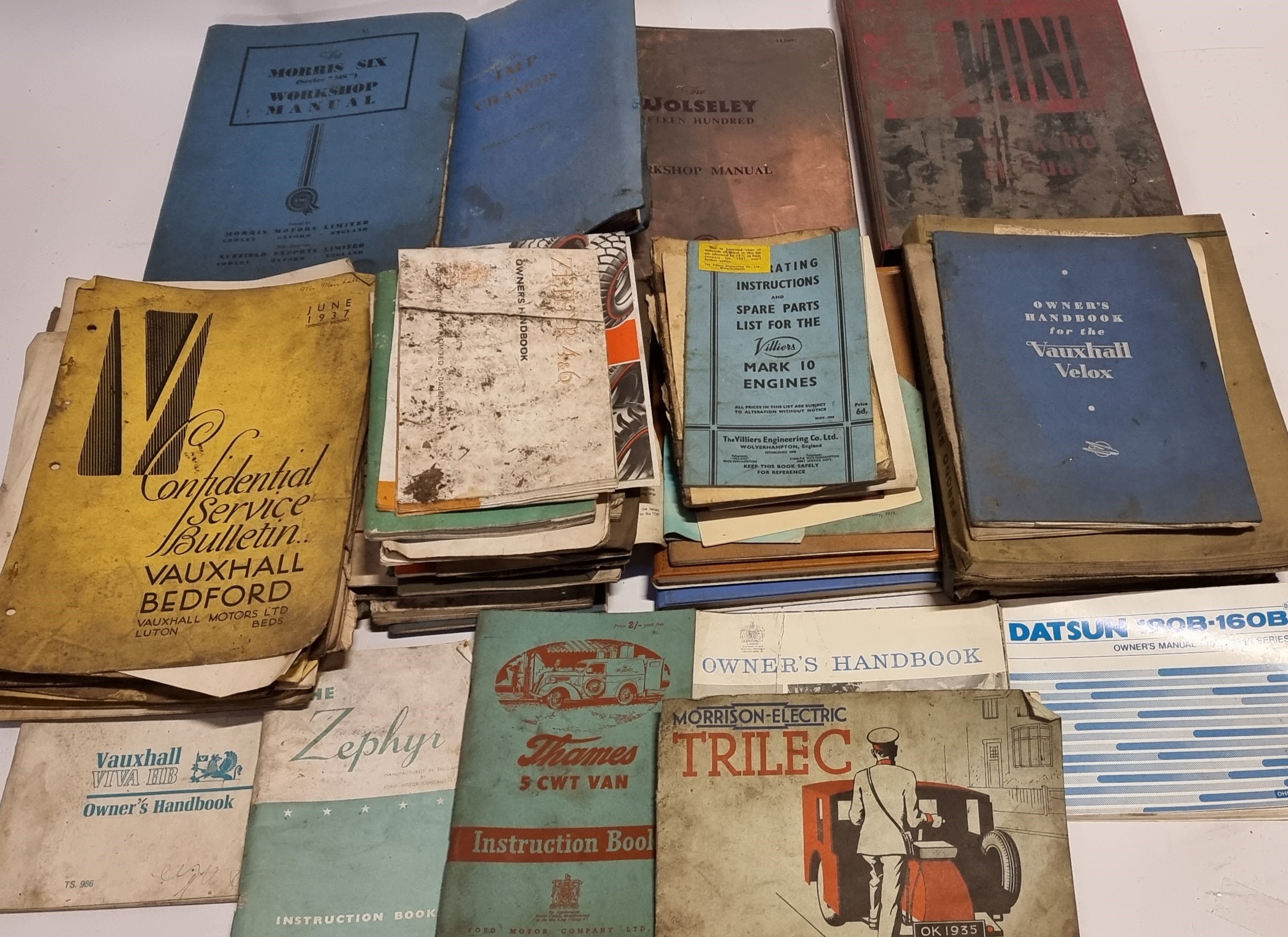 A collection of motorcar manuals and handbooks, to include Mini, Viva HB and Trilec