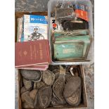 A collection of engine gaskets, inner tubes, knee pads and magazines