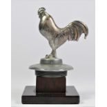 A chrome car mascot in the form of a cockerel mounted on a radiator cap, 14cm.
