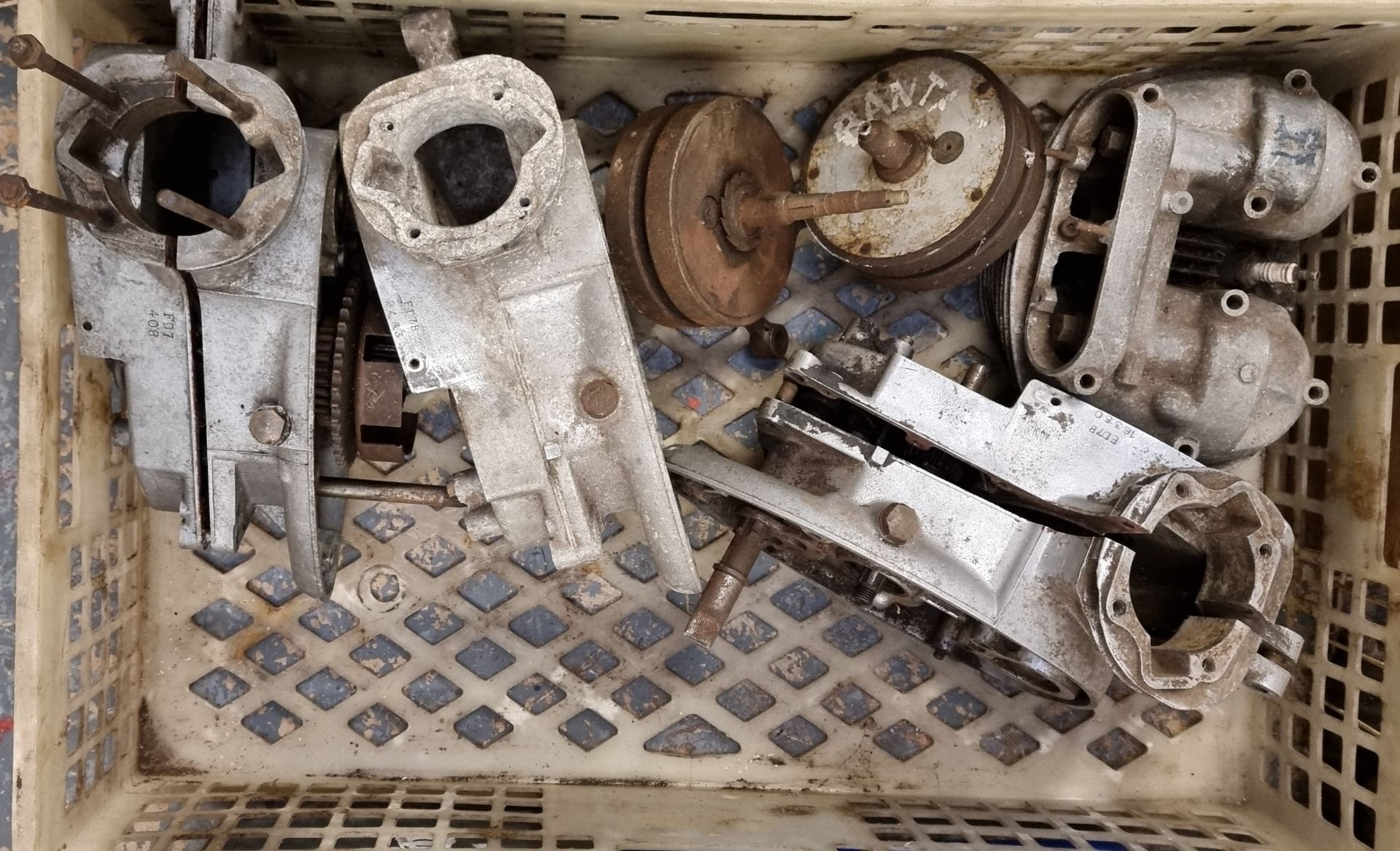 Three BSA Bantam crankcases, ED7B 16350, ED7B 2483, and FD7 408, two crankshafts and a cylinder