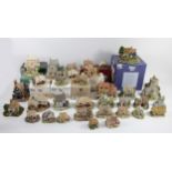 A collection of thirty five Lilliput Lane models, six with original boxes. (2)