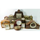 A collection of mid 20th Century and later mantle clocks to include brass cased carriage,