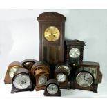 A large German made wall clock, mahogany cased, glazed front, painted dial, together with a