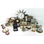 A collection of mantle, carriage and wall hanging clocks, to include brands such as Smiths, Taylor &