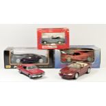 A collection of five scale model of cars, including a Burago Ferrari F50, boxed, a Tonka Jaguar XJS,