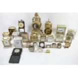 A collection of early 20th Century and later mantle clocks, carriage clocks and traveling alarm