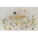 A collection of promotional drinking glasses to include, Smirnoff, Hennessy, Cinzano and others.