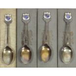 Four silver and enamel golf spoons, Birmingham 1926, for Sand Moor Golf Club, Leeds, each box with
