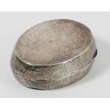 An 800 standard silver oval hammered box, bearing Austrian control marks, 7 x 5.5 x 2.5cm, 67gm