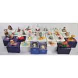 A collection of twenty eight Grolier Disney Christmas decorations, boxed, including Figaro (127),