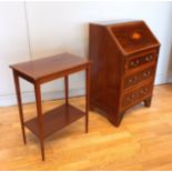 An Edwardian inlaid mahogany Bureau, having three drawers below a fall front opening to reveal a