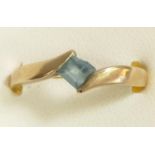 A 9ct gold and blue topaz ring, stone chipped, O, 2.1gm