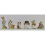A collection of six Beswick Beatrix Potter's figurines to include - Mrs Tiggy Winkle,