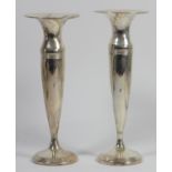 A silver pair of tapering vases, Birmingham 1917, (worn marks), 25cm, loaded