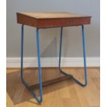 A child's Tri-ang writing desk, pine with hinged top, on painted metal legs, blue, 50cm x 68cm x