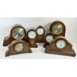 Seven mantle clocks to include a W.A.Perry & Co Birmingham, balloon shaped mantle clock with fruit