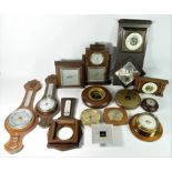 A collection of mantle clocks and barometers, to include brands such as Enfield,