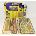 A collection of Scalextric track and track side decoration, together with a tin plate traffic