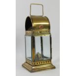 A modern brass hand lantern plated G.W.R, complete with burner.