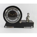 A 1930s Art Deco Westminster chime mantel clock, ebonised case incorporating a chrome figurine of