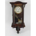 A 19th Century miniature Vienna style wall clock, circa 1880, having 8 day movement, the case of