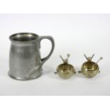 A Victorian pair of electroplated novelty salt pots, in the form of crossed hockey sticks with a