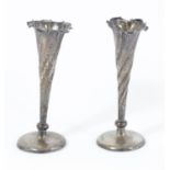 A Victorian silver tapering fluted specimen vases, Chester 1899, 12.5cm, loaded