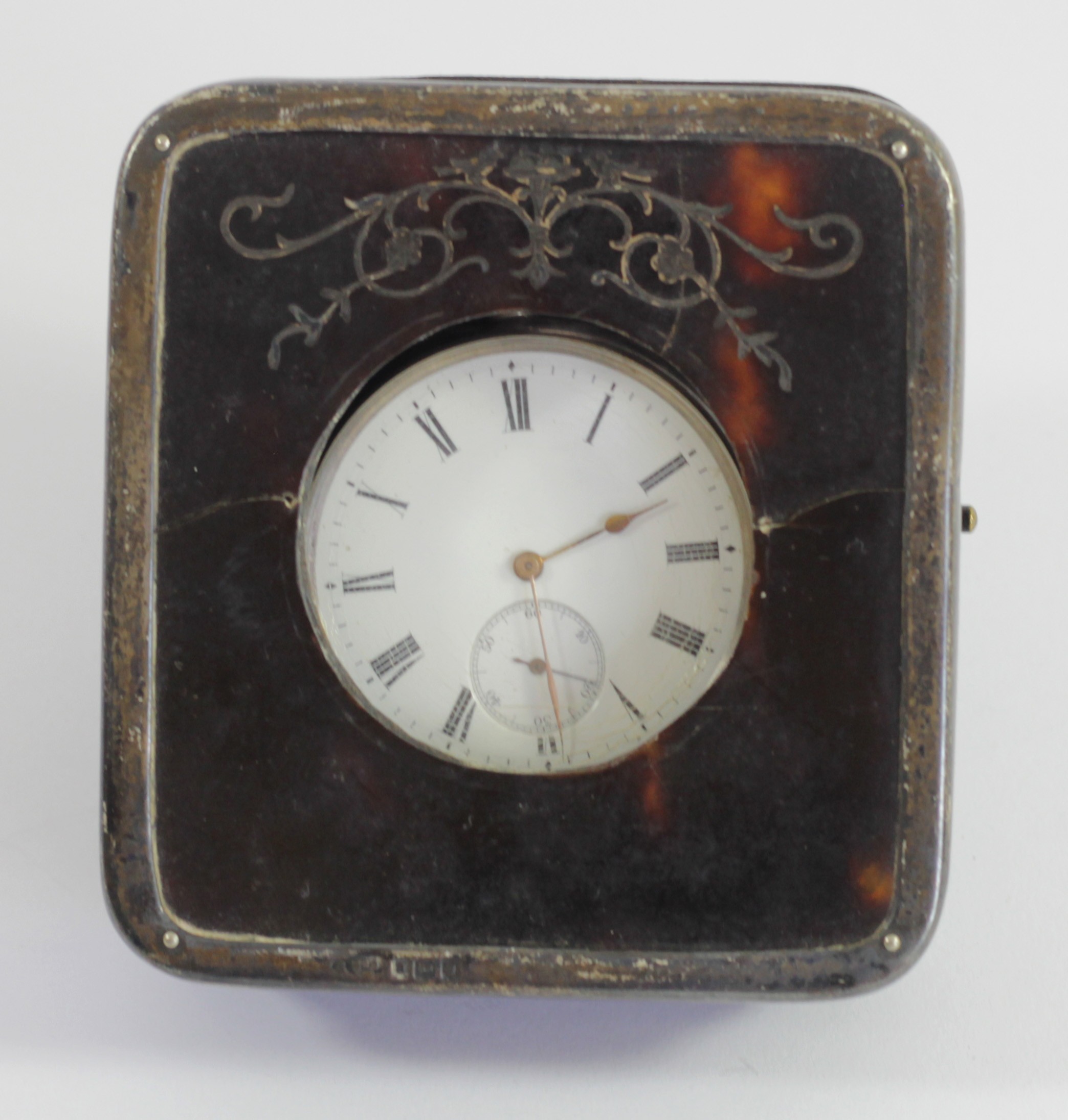 A Victorian silver and tortoiseshell pocket watch easel case, London 1896, containing a 0.935