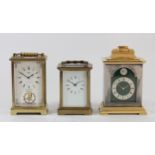 A Thwaites & Reed 8 day English carriage clock, 15cm tall, together with a West German brass cased