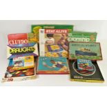 A collection of board games, to include Stay Alive, Cluedo, Tiddely Winks, Striker League Champions,