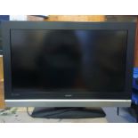 A Bush (model LCD32TV07HD) 32 inch TV, with remote, together with a Bush 22 inch LCD TV, built in