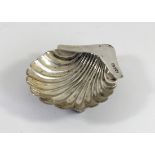 A Victorian silver shell dish, Sheffield 1895, raised on three ball feet, 10cm, 37gm