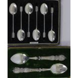 An Art Deco silver set of six coffee spoons, Sheffield 1939, case, 50gm, together with a pair of