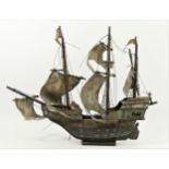 A painted wood model of a 17th century galleon, fabric sails and flags, 65cm stern to bow sprite