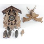 Albert Schwab, Karlsrune, a Black Forest musical cuckoo clock, the case with revolving characters,