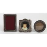 Two silver mounted photograph frames, Birmingham 1911 and 1918 and an EPNS example (3)