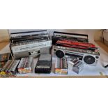 Six portable cassette "boom boxes", to include a Grundig RR 1500, a Sanyo M7130L, two Sharp WQ-